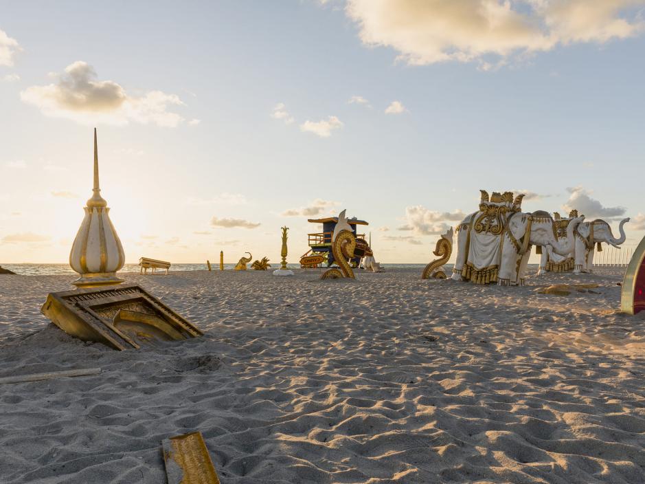 A collection of giant pieces from the abandoned Taj Mahal casino placed on the beach