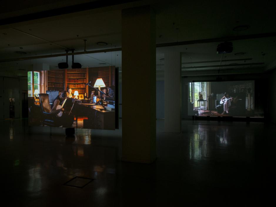 Hanging Screens with projections of musicians playing intruments