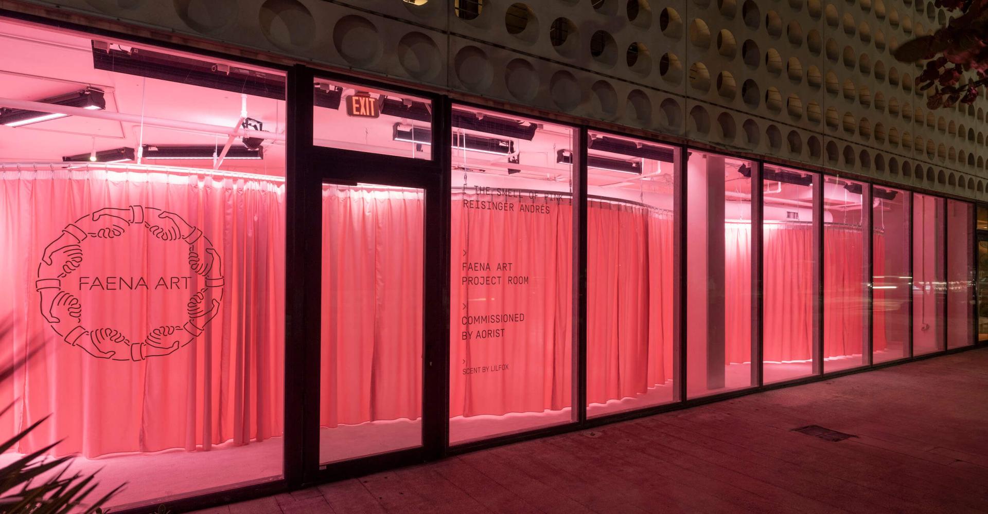 exterior windows of Faena Art Project Room with pink interior lights